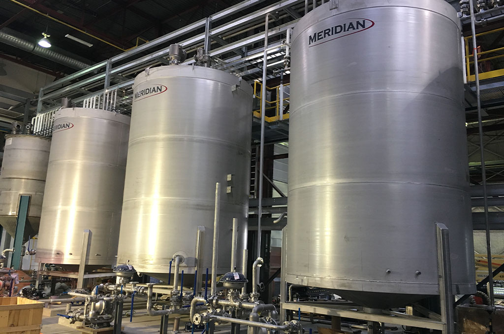 Meridian Manufacturing Image 3: Optimizing Storage Solutions for the Maple Industry & Food Production: Meridian’s Stainless Steel Flat Bottom Tanks